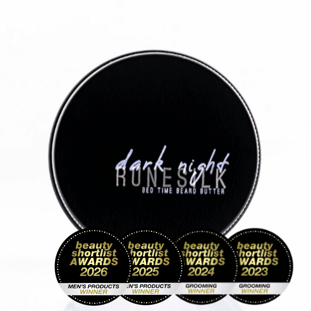 Black container of 'dark night RUNESILK' bed time beard butter with five gold and black awards below on a white background.